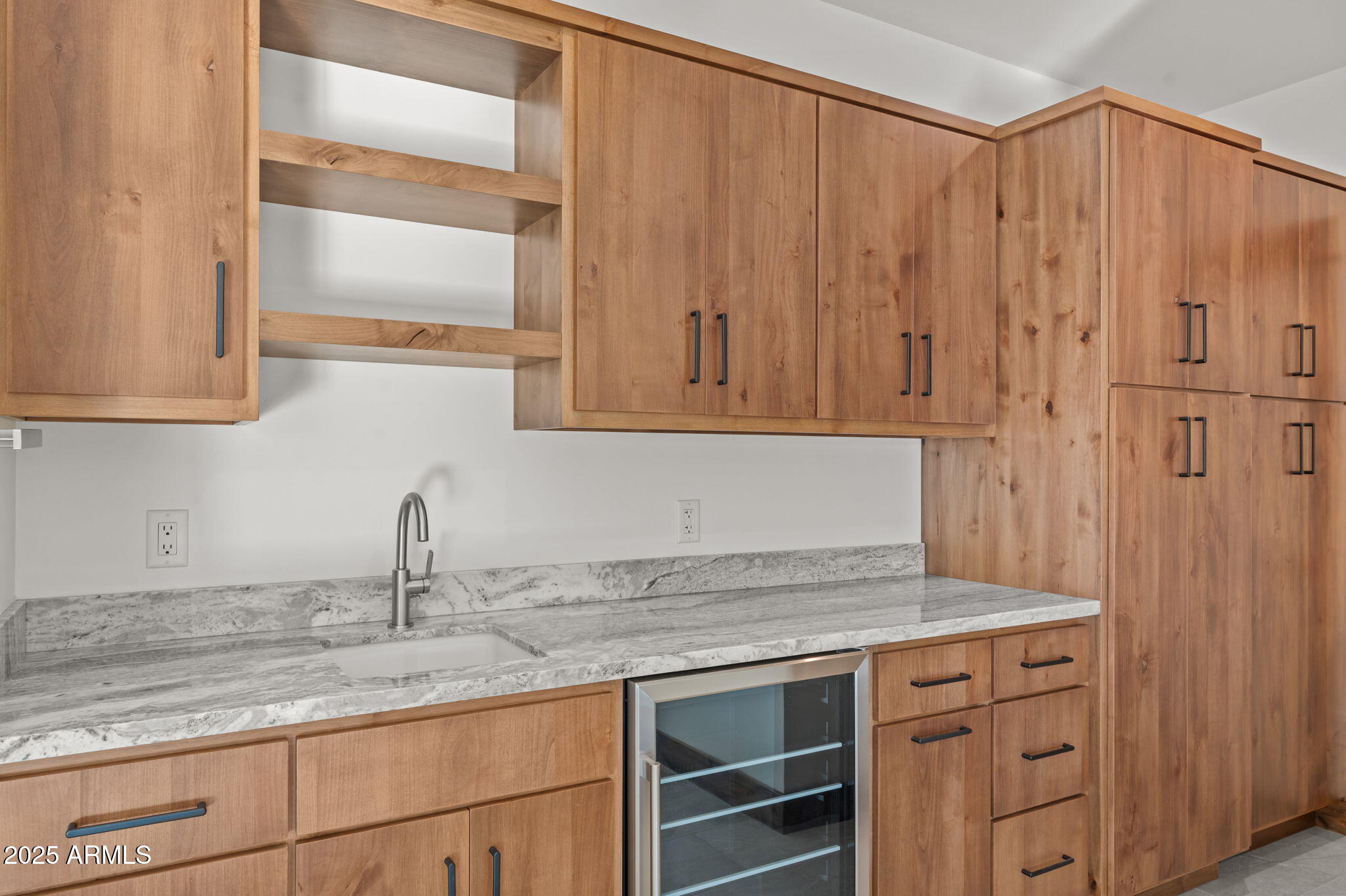 30100 Walter Road Wickenburg, AZ 85390 - Photo 45 of 66 a kitchen with granite countertop a sink cabinets and stainless steel appliances