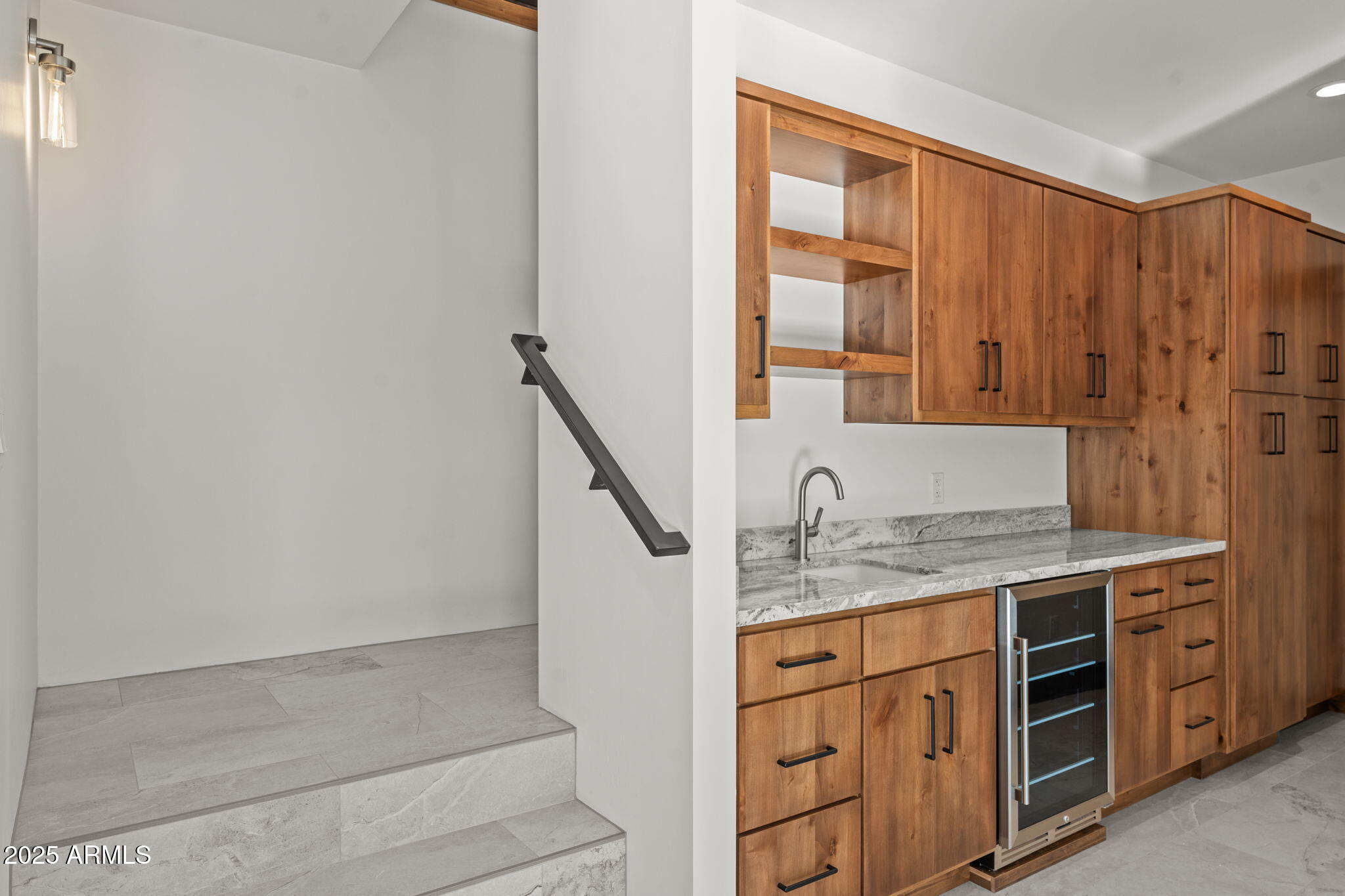 30100 Walter Road Wickenburg, AZ 85390 - Photo 46 of 66 a bathroom with a granite countertop sink a mirror and a shower