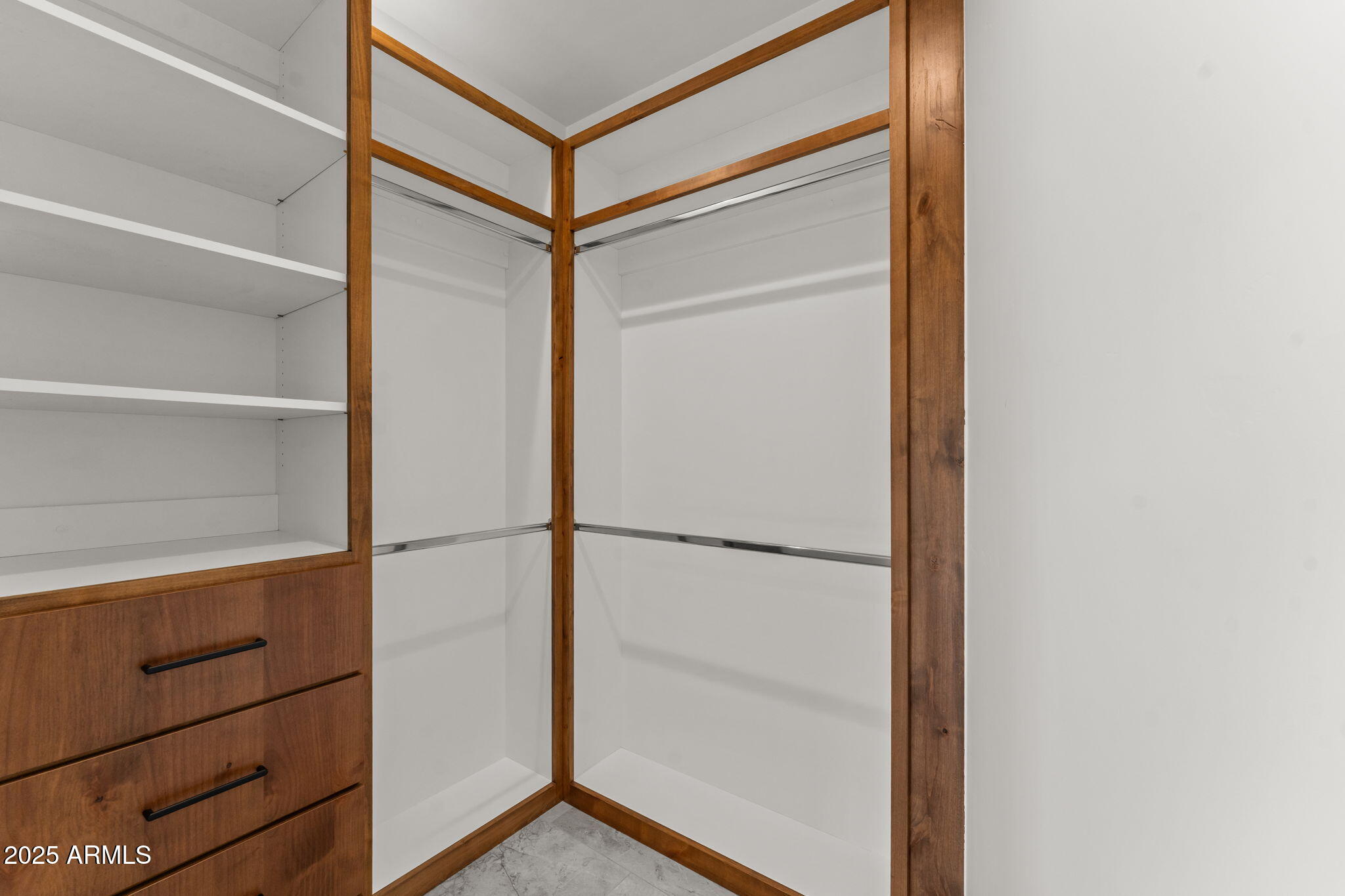 30100 Walter Road Wickenburg, AZ 85390 - Photo 49 of 66 a view of walk in closet with empty racks