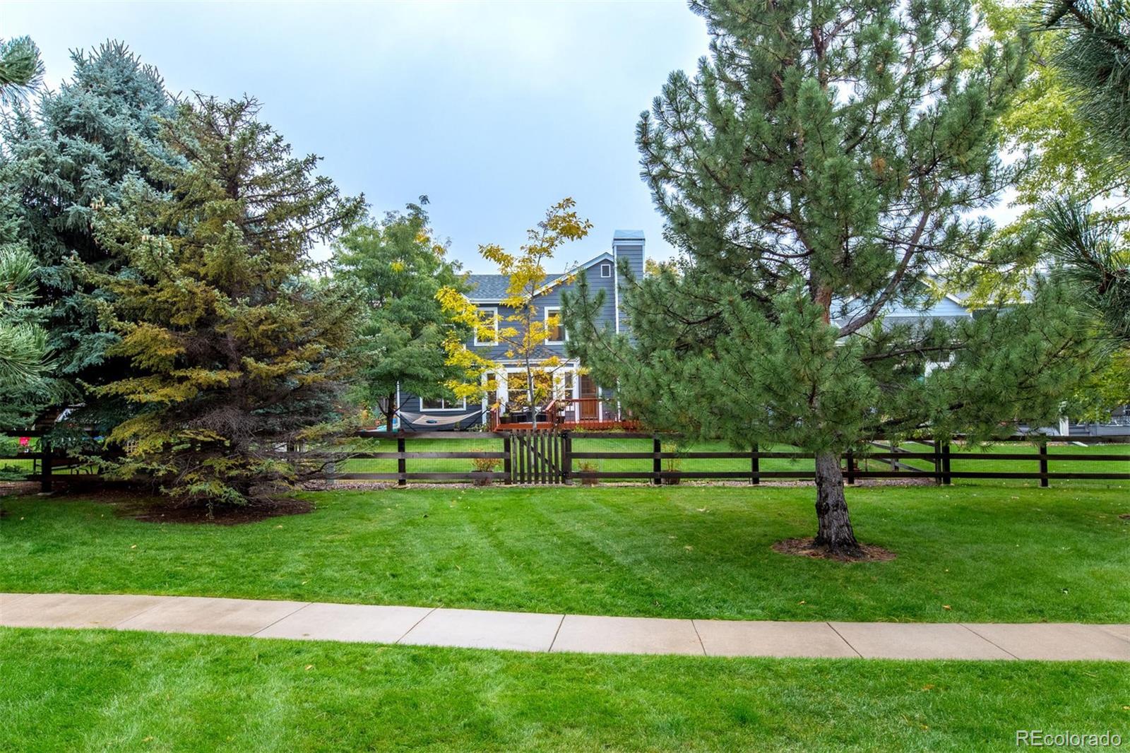10037 Hooker Street Westminster, CO 80031 - Photo 33 of 40 a childrens park with lots of trees and plants