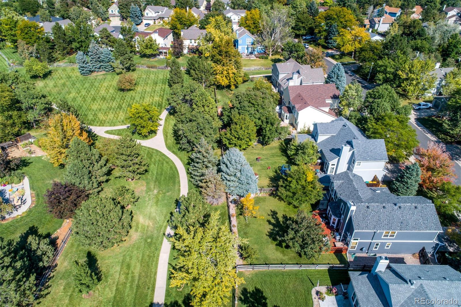 10037 Hooker Street Westminster, CO 80031 - Photo 39 of 40 an aerial view of residential houses with outdoor space and trees