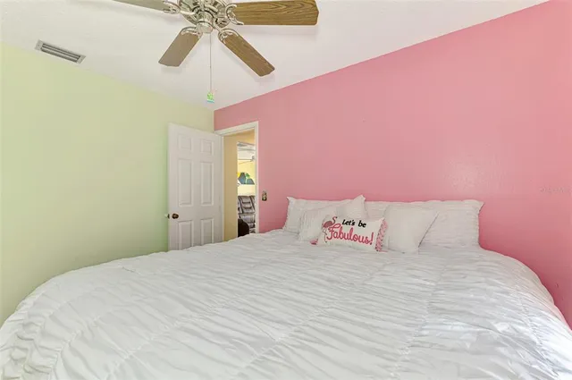 an aerial view of a house with garden space and street view