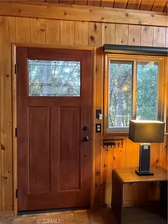 a kitchen with sink refrigerator and window