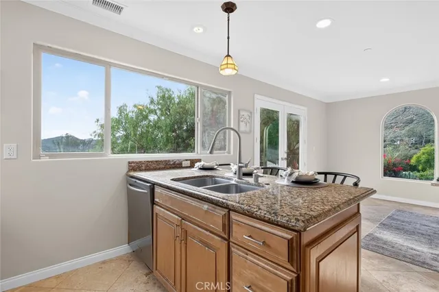 a view of staircase with wooden floor