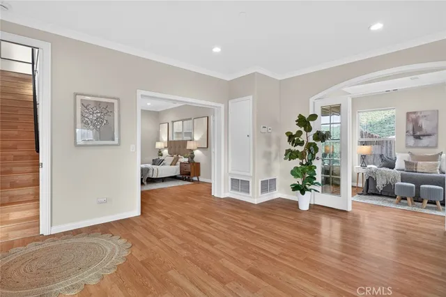a view of a dining room with furniture window and wooden floor