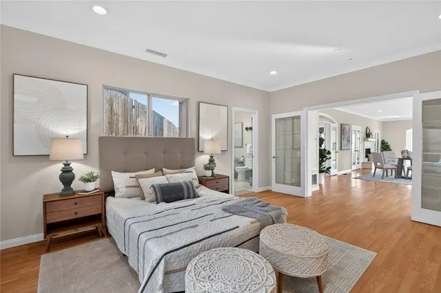 a bedroom with a bed and a table