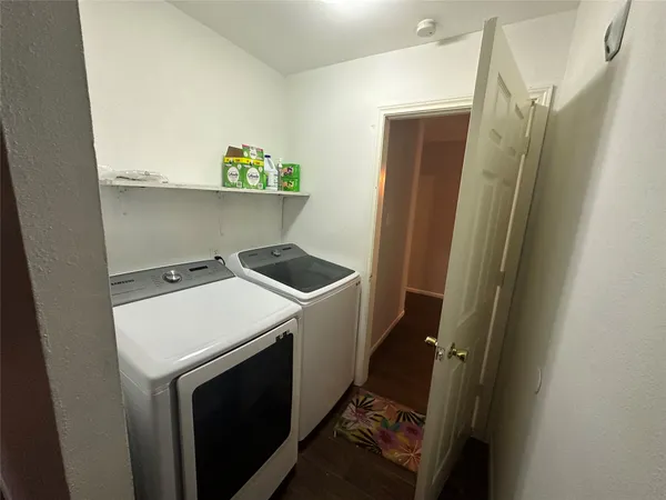a utility room with dryer and washer