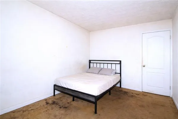 a room with a bed and a table