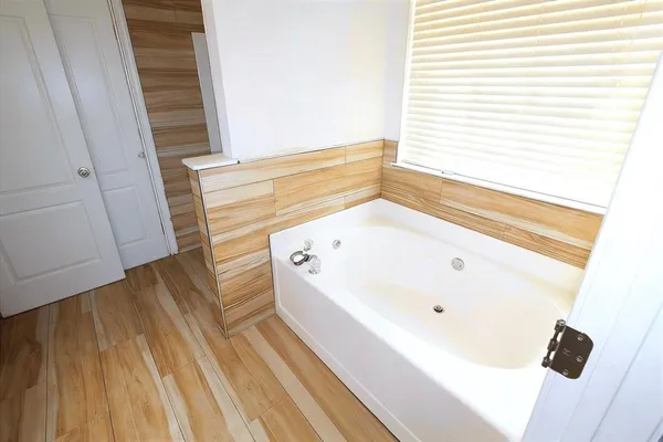a bathroom with a bathtub