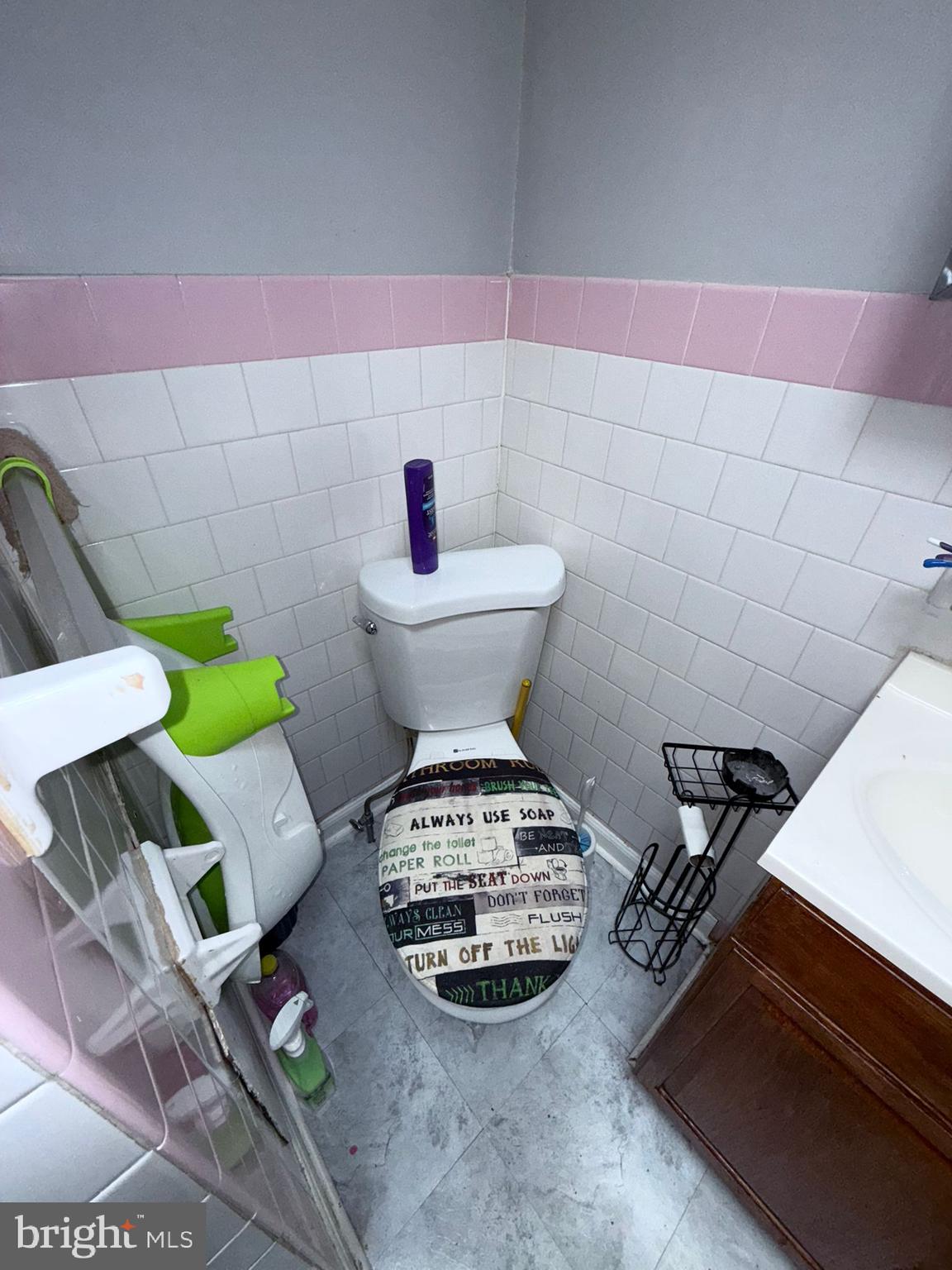 2117 Penrose Avenue Baltimore, MD 21223 - Photo 16 of 30 a bathroom with a sink and a toilet