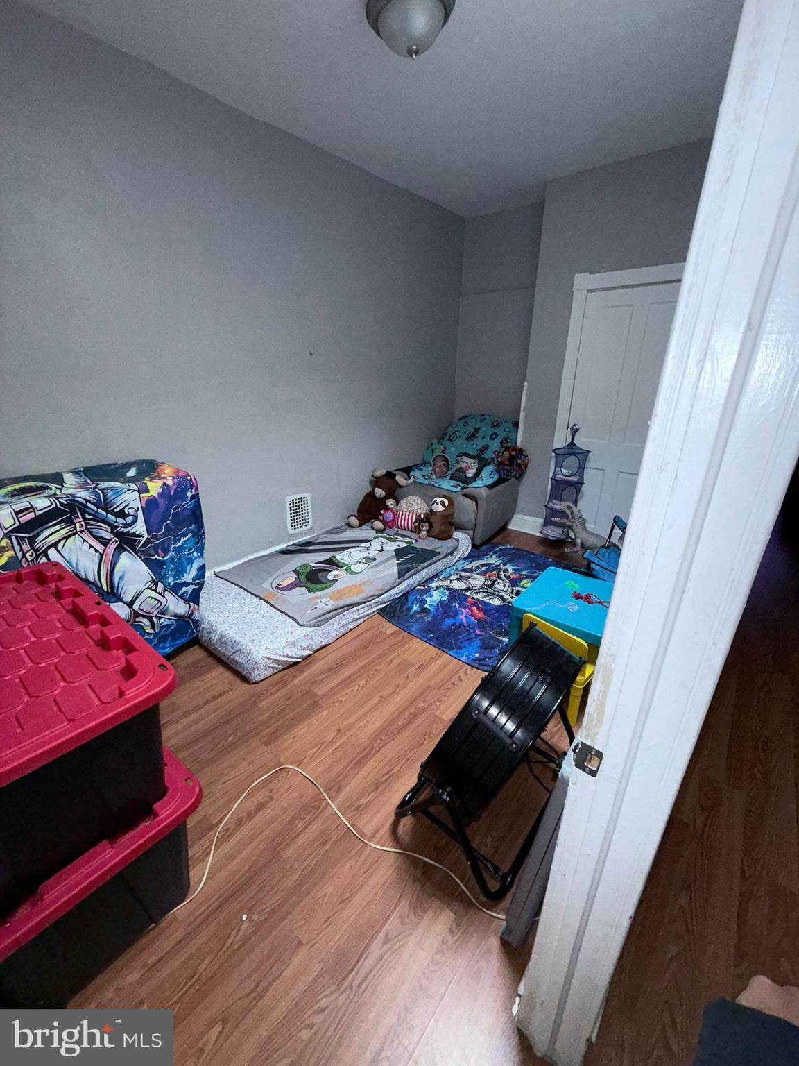 2117 Penrose Avenue Baltimore, MD 21223 - Photo 17 of 30 a bedroom with bed and a window