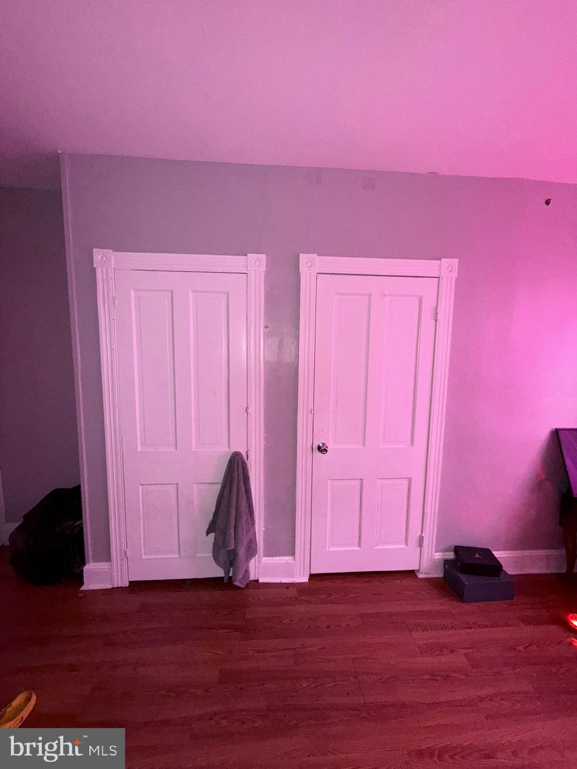 2117 Penrose Avenue Baltimore, MD 21223 - Photo 23 of 30 a view of empty room with wooden floor and fan