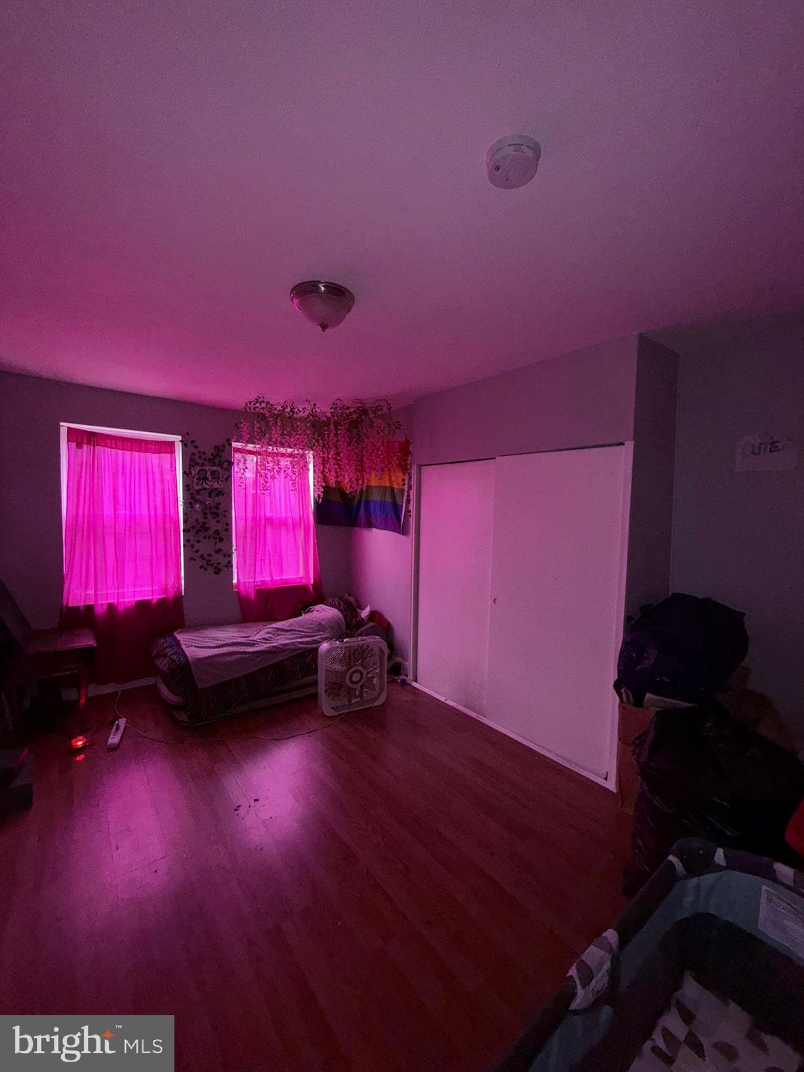 2117 Penrose Avenue Baltimore, MD 21223 - Photo 25 of 30 a view of livingroom with furniture and wooden floor