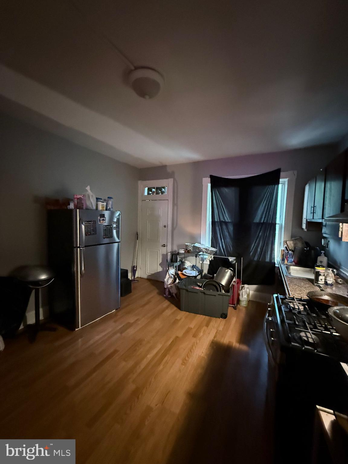 2117 Penrose Avenue Baltimore, MD 21223 - Photo 9 of 30 a view of a living room and dining room