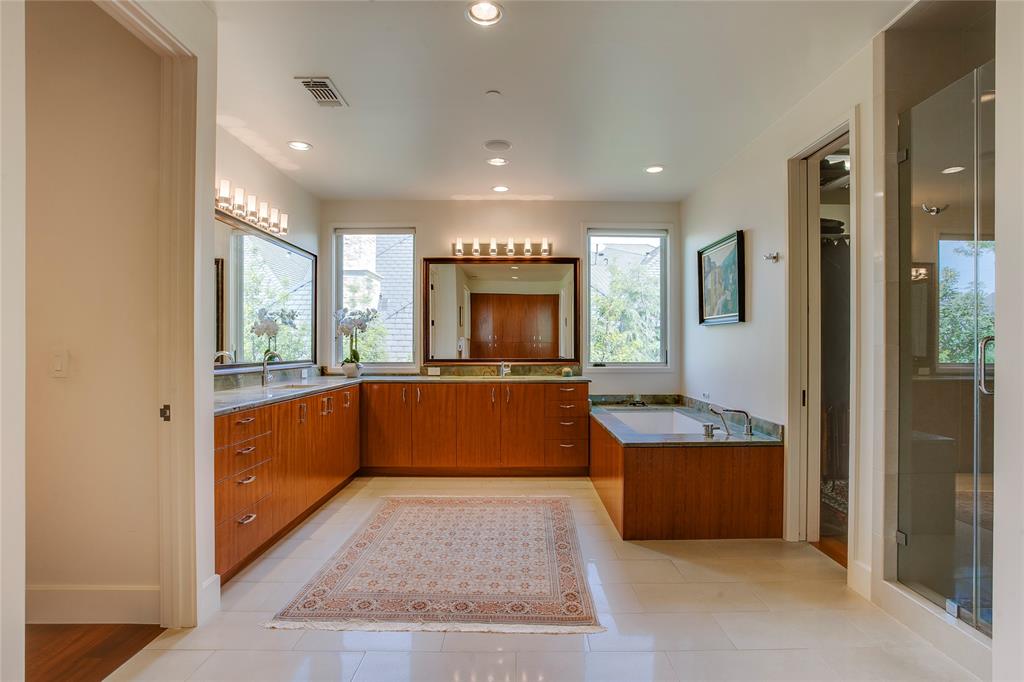 48 Ash Bluff Lane Dallas, TX 75248 - Photo 13 of 40 a large bathroom with a large tub and sink