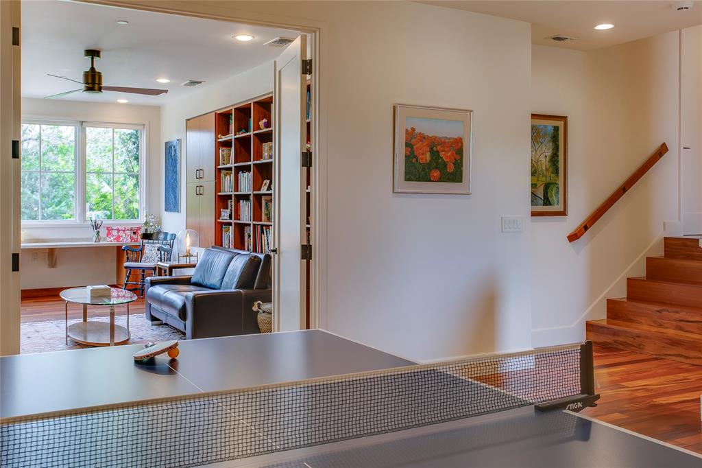 48 Ash Bluff Lane Dallas, TX 75248 - Photo 15 of 40 a living room with furniture window and bookshelf
