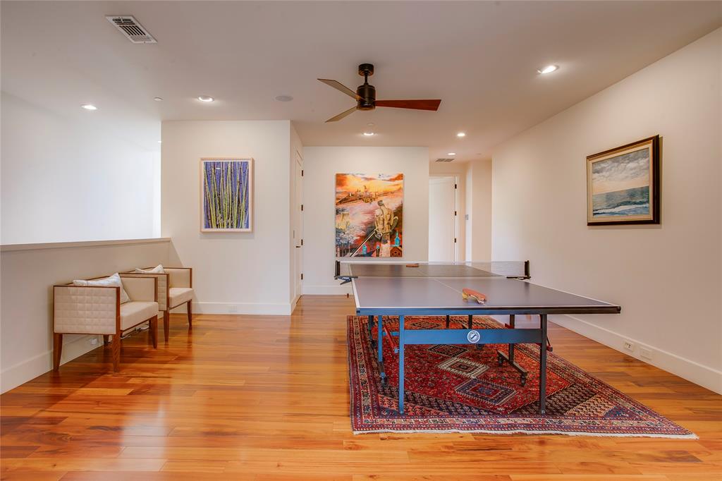 48 Ash Bluff Lane Dallas, TX 75248 - Photo 16 of 40 a living room with furniture and a wooden floor