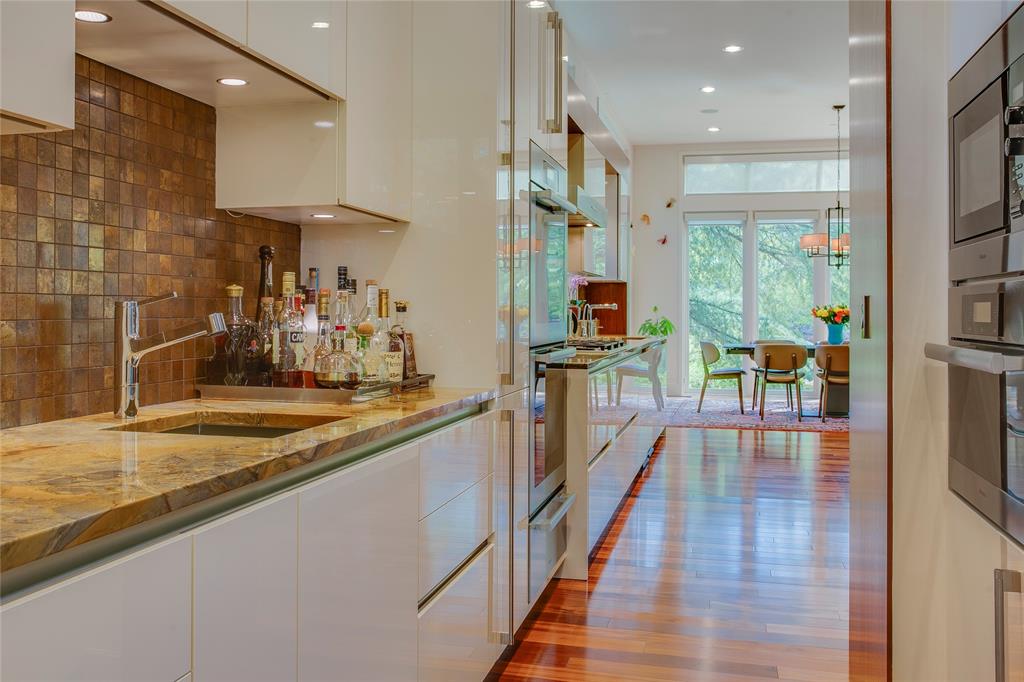 48 Ash Bluff Lane Dallas, TX 75248 - Photo 27 of 40 a view of a living room and dining room
