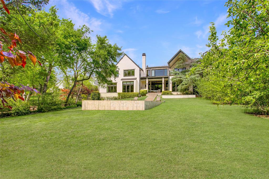 48 Ash Bluff Lane Dallas, TX 75248 - Photo 38 of 40 a view of house with a big yard