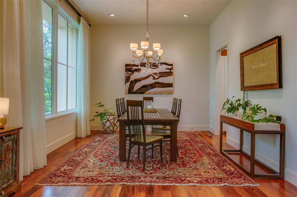 48 Ash Bluff Lane Dallas, TX 75248 - Photo 7 of 40 a view of a dining room with furniture window and wooden floor