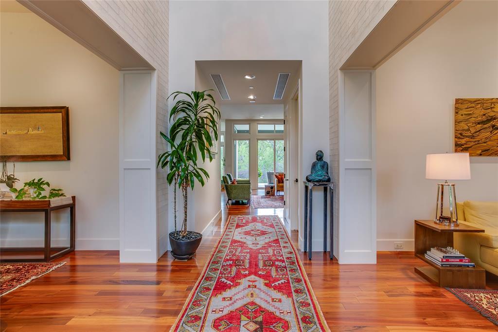 48 Ash Bluff Lane Dallas, TX 75248 - Photo 8 of 40 a living room with furniture and a table