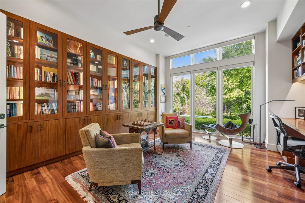 48 Ash Bluff Lane Dallas, TX 75248 - Photo 9 of 40 a living room with furniture and a floor to ceiling window