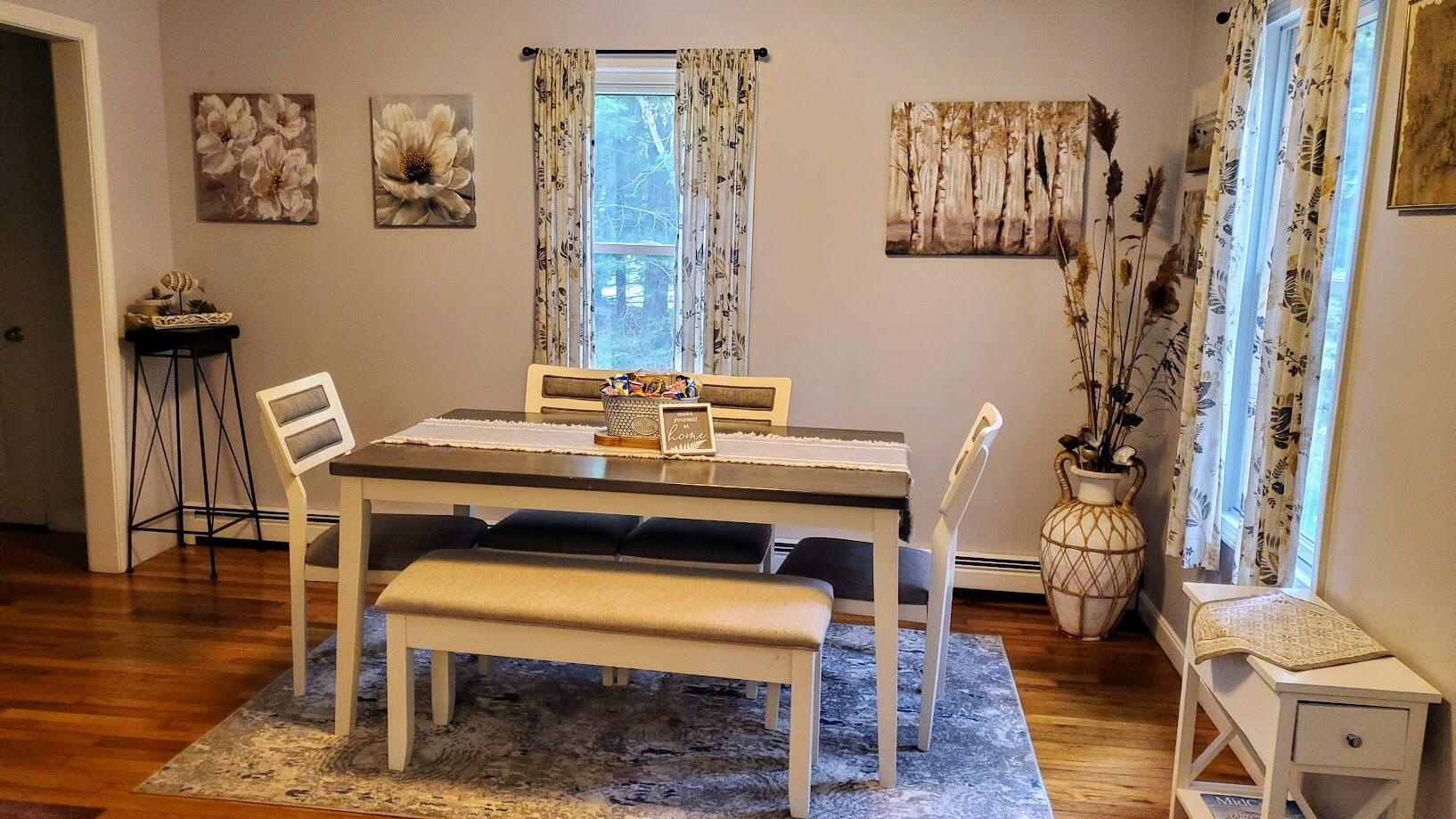 185 Monhegan Road East Falmouth, MA 02536 - Photo 11 of 23 a view of a workspace with furniture and wooden floor