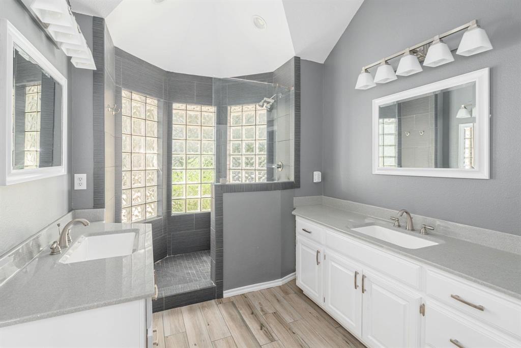 1380 Meandro Ria Lane Fairview, TX 75069 - Photo 11 of 14 a spacious bathroom with double vanity and a mirror