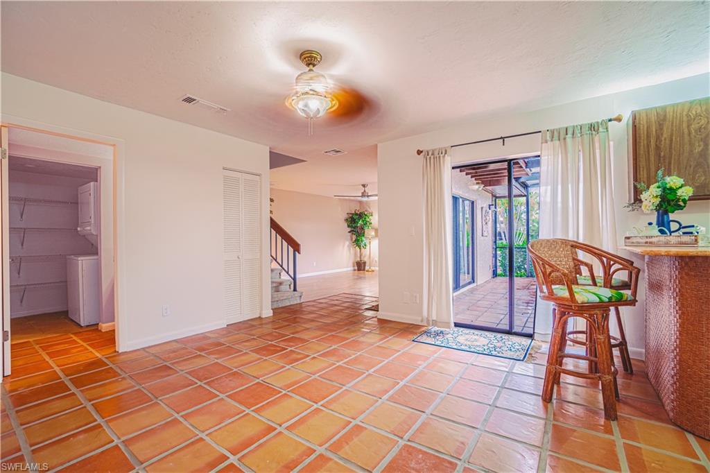 200 Marseille Drive, Unit 12A Naples, FL 34112 - Photo 11 of 36 a view of livingroom with furniture and a potted plant