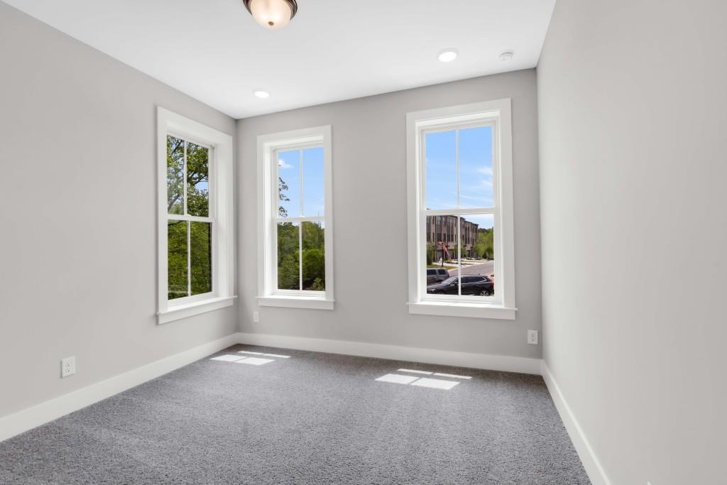 923 Echo Pk Drive Suwanee, GA 30024 - Photo 17 of 26 an empty room with windows