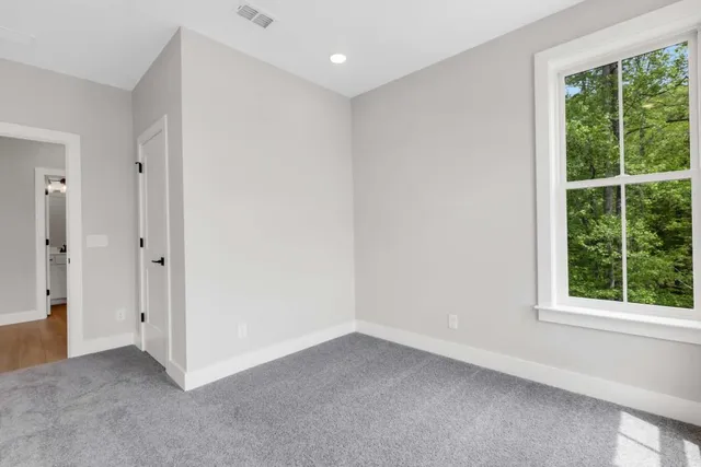 a view of a room with racks on the wall