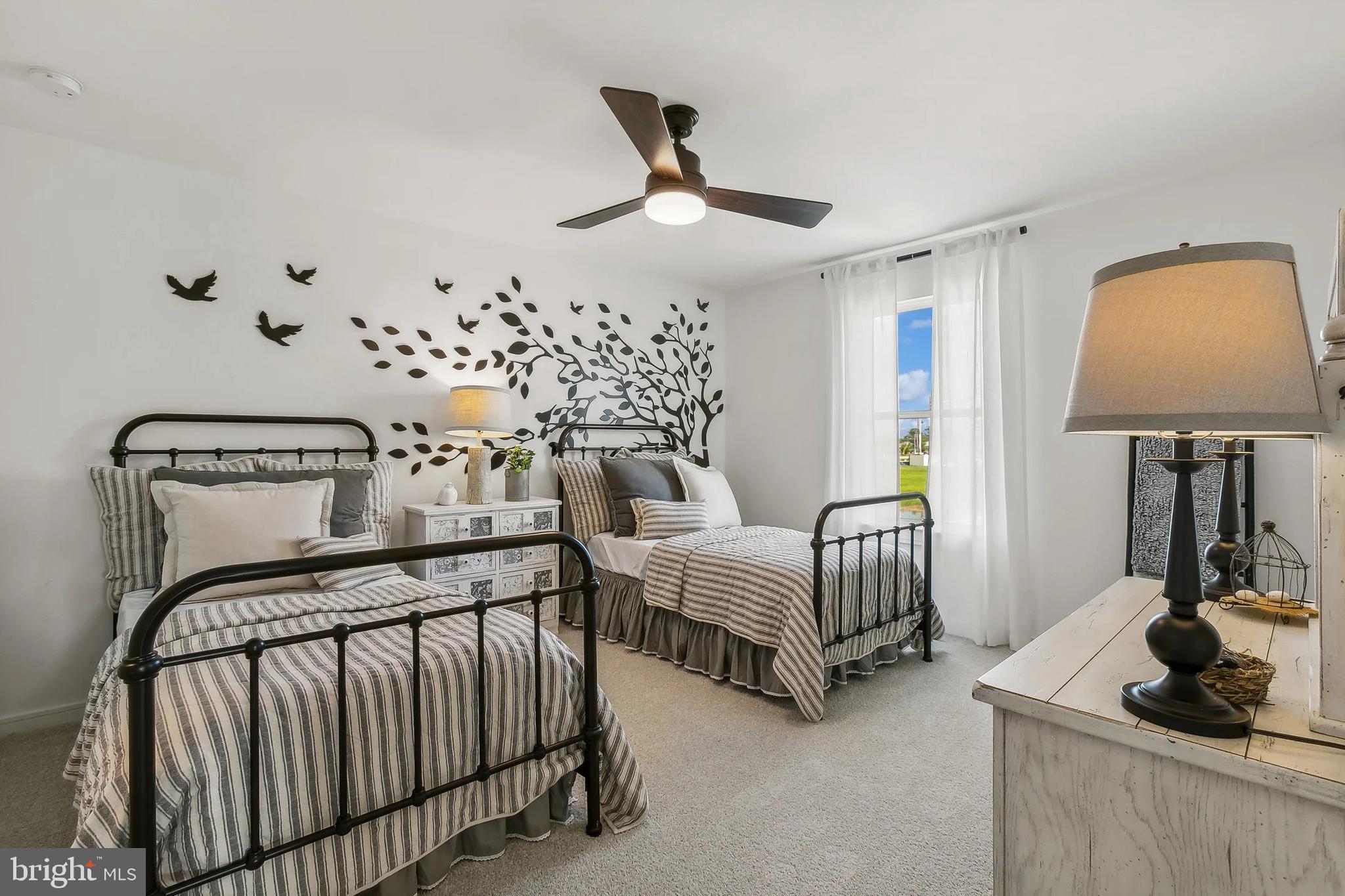 437 Gerry Street Ranson, WV 25438 - Photo 24 of 29 a bedroom with bed and window