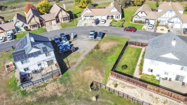 an aerial view of a house swimming pool