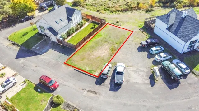 an aerial view of a house with a swimming pool