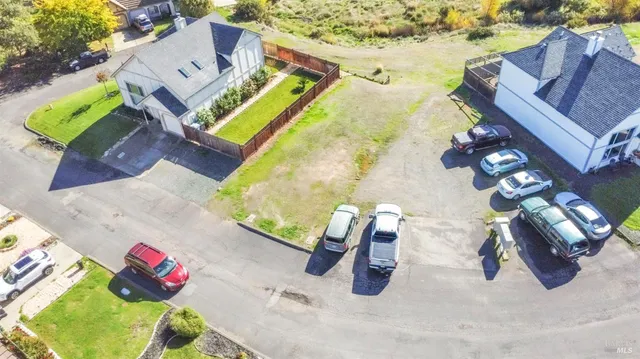 an aerial view of a house having patio