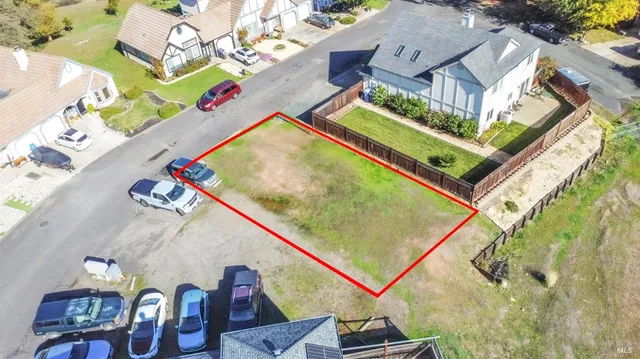 an aerial view of a house with a swimming pool