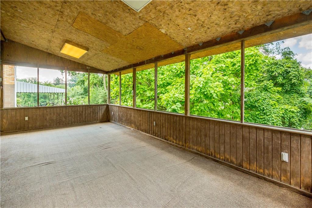 3406 McRoberts Road Pittsburgh, PA 15234 - Photo 17 of 19 a view of an empty room with a large window