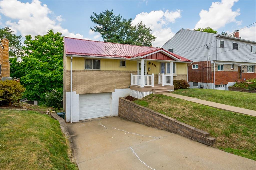 3406 McRoberts Road Pittsburgh, PA 15234 - Photo 2 of 19 a front view of a house with a yard