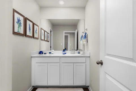 a bathroom with a bathtub and a sink