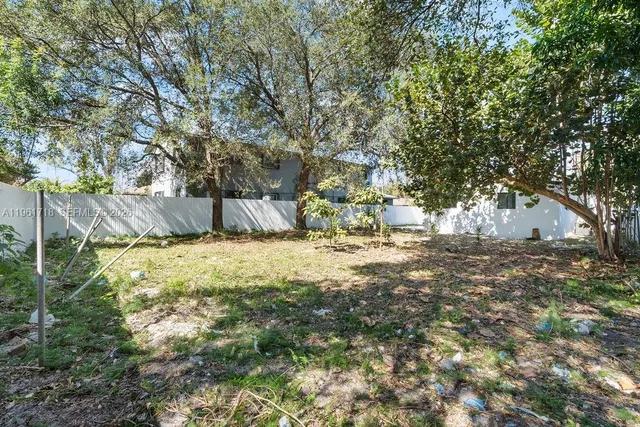 a bathroom with a tree