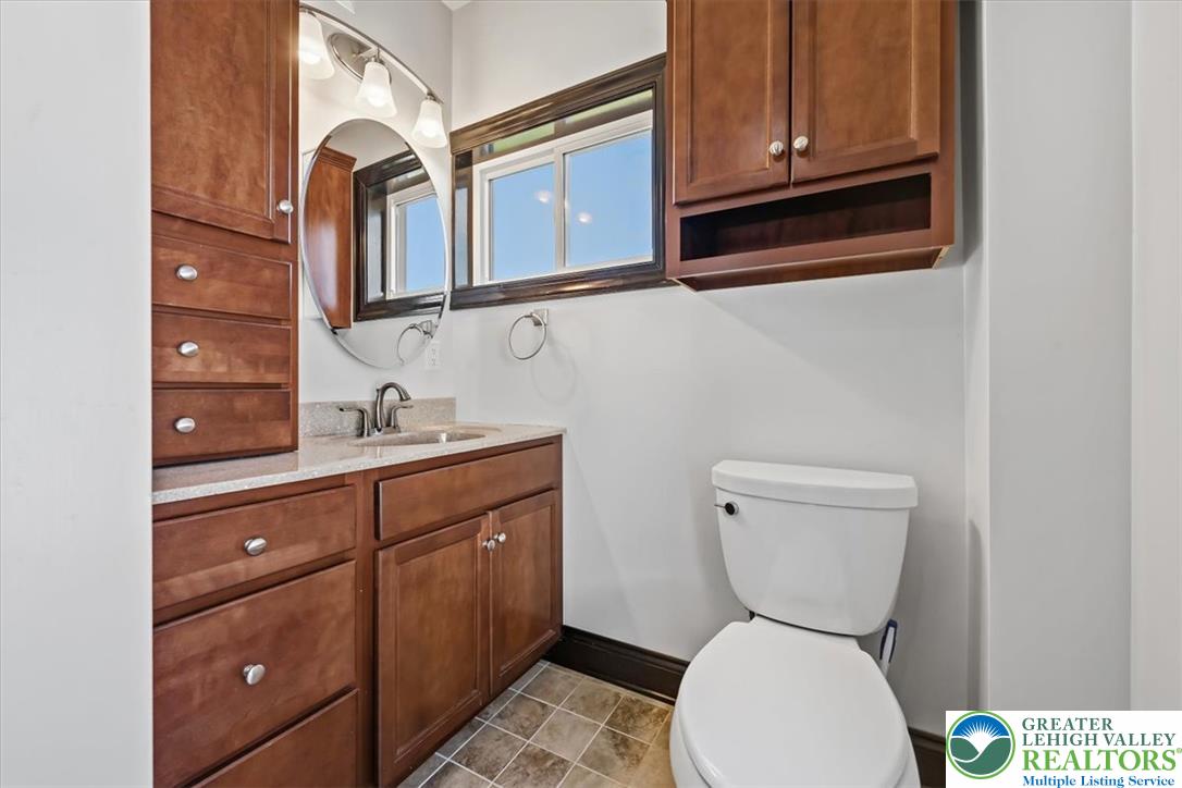 3453 Main Street Slatington, PA 18080 - Photo 16 of 30 Functional full bathroom with ample storage and a window for natural light.
