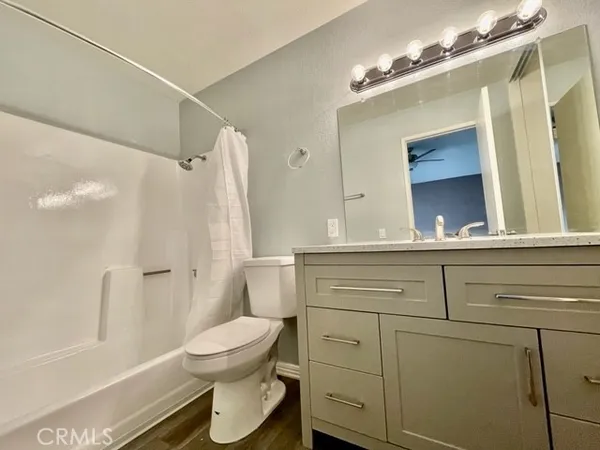 a bathroom with a toilet a sink and a bathtub