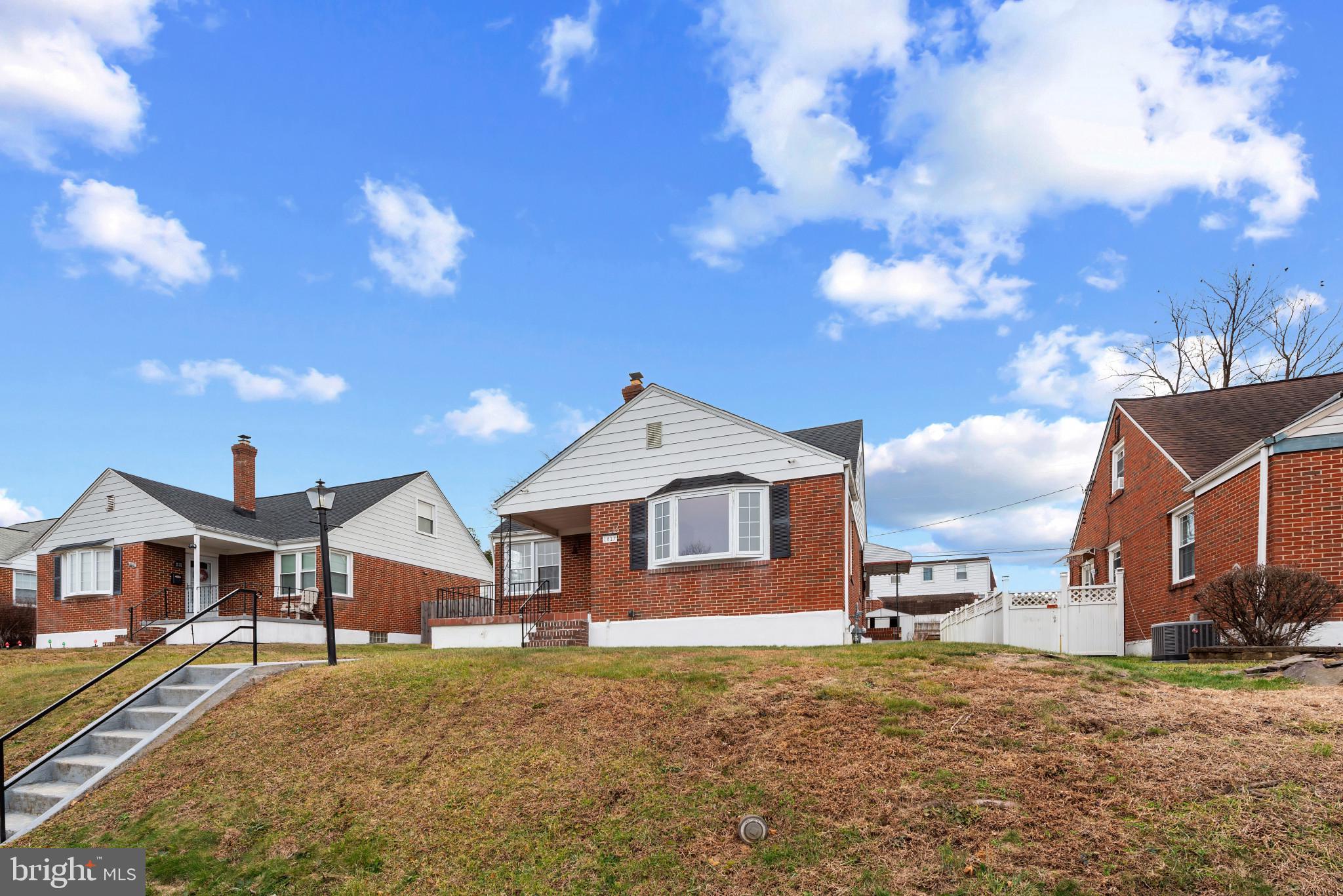 1817 Hanford Road Rosedale, MD 21237 - Photo 24 of 32 a front view of a house with a yard
