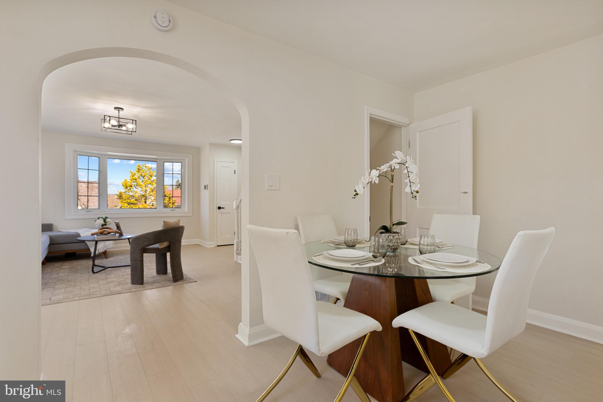 1817 Hanford Road Rosedale, MD 21237 - Photo 5 of 32 a view of a dining room with furniture and wooden floor