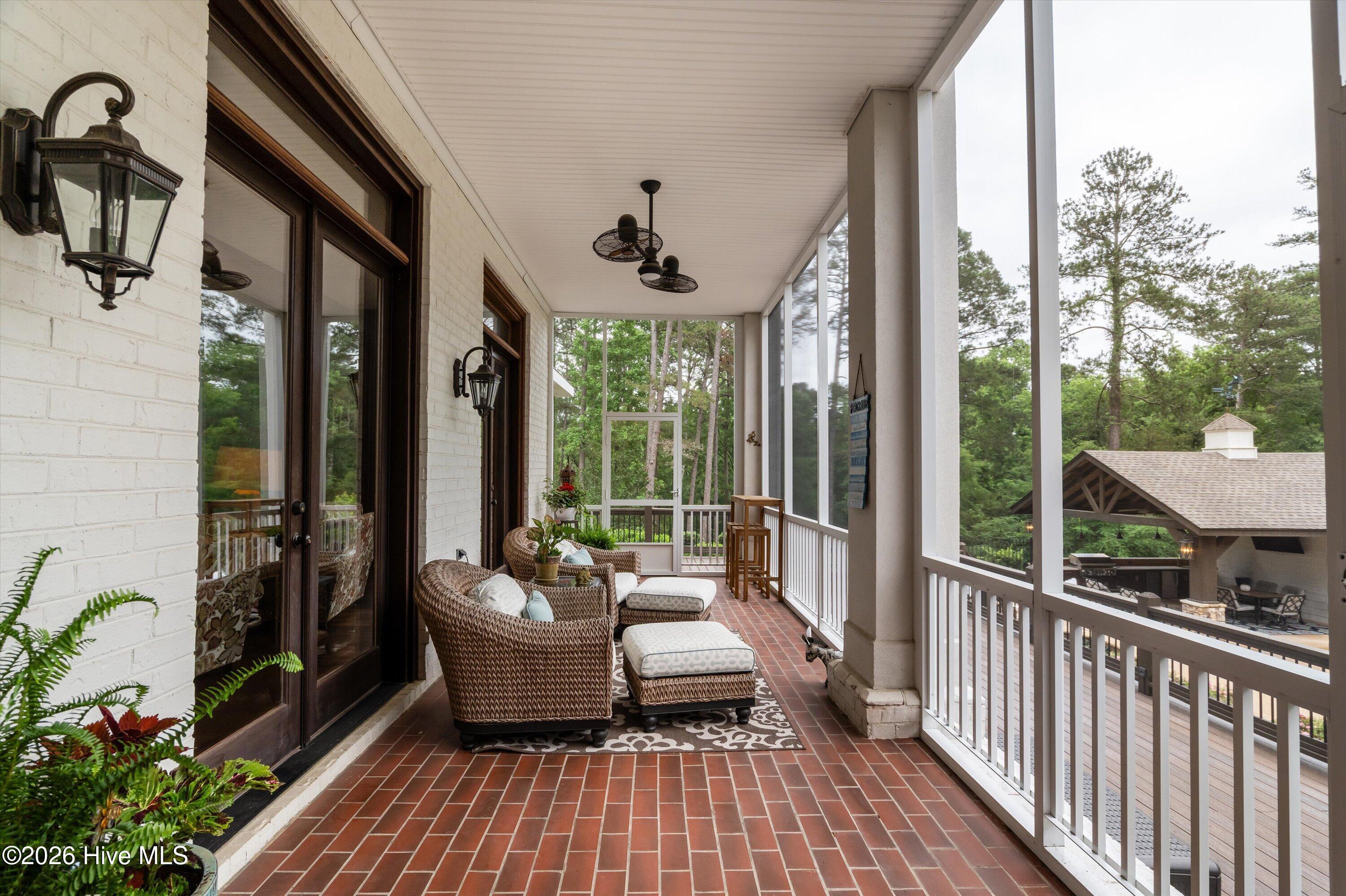 6218 Columbia Road Appling, GA 30802 - Photo 15 of 97 Back screen porch with access from living room and kitchen overlooking pool and bakyard