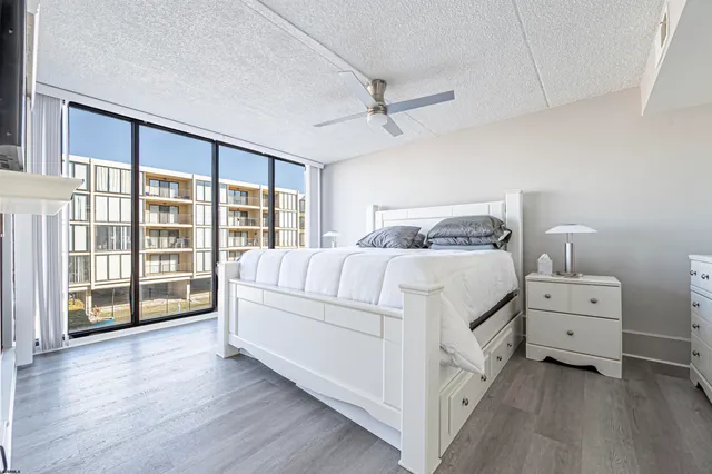 a view of a bathroom with a shower and a sink