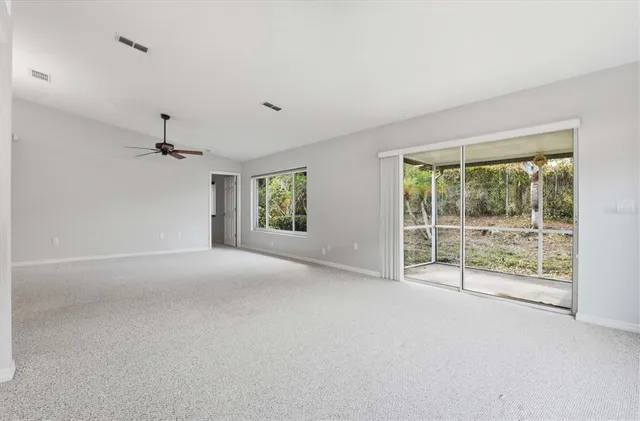 a view of a room with a large window