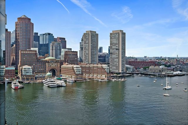 a view of a city with tall buildings