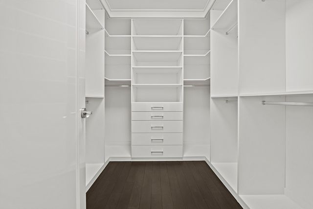a view of an empty walk in closet