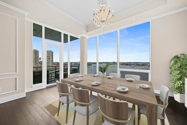 a view of a dining room with furniture window and outside view